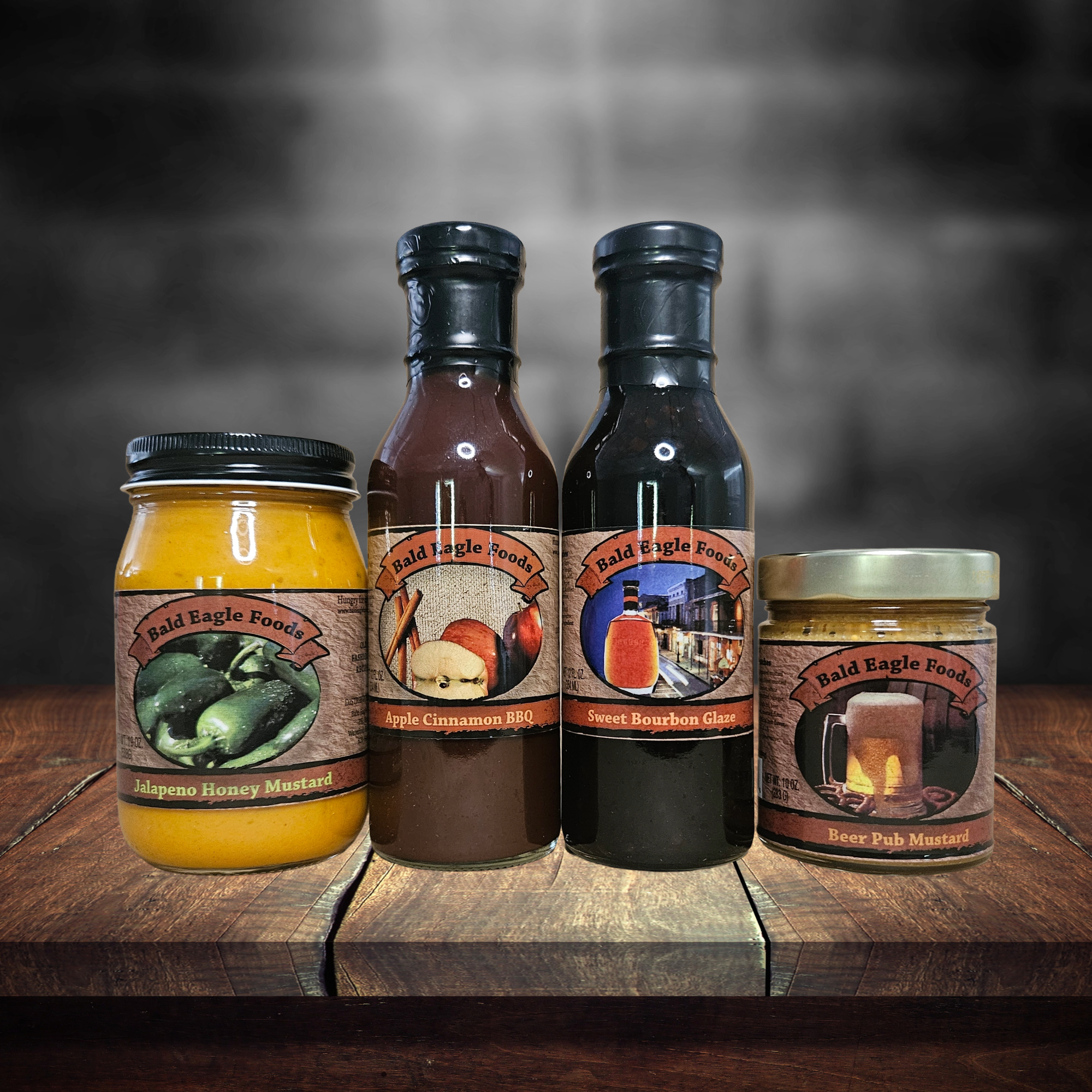 Smokehouse Sampler — Apple Cinnamon BBQ Sauce, Jalapeno Honey Mustard, Beer Pub Mustard, Sweet Bourbon Glaze